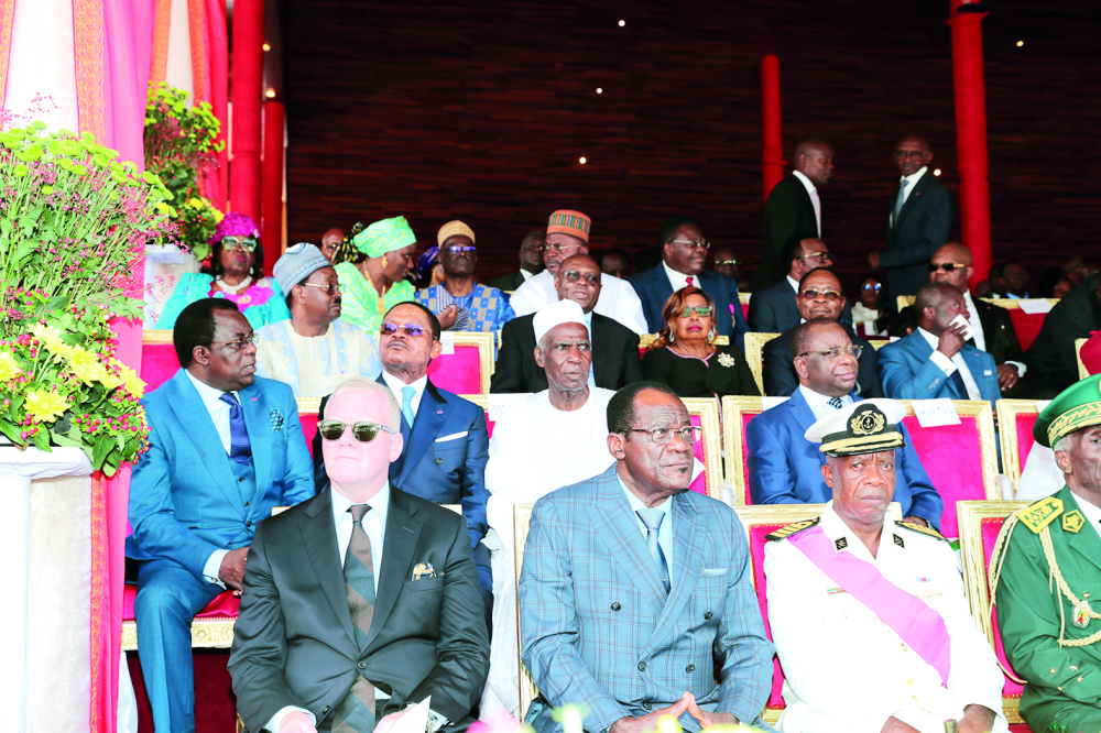 President Paul Biya shaking hands with the Secretary General of the ISA, one of the special guests.